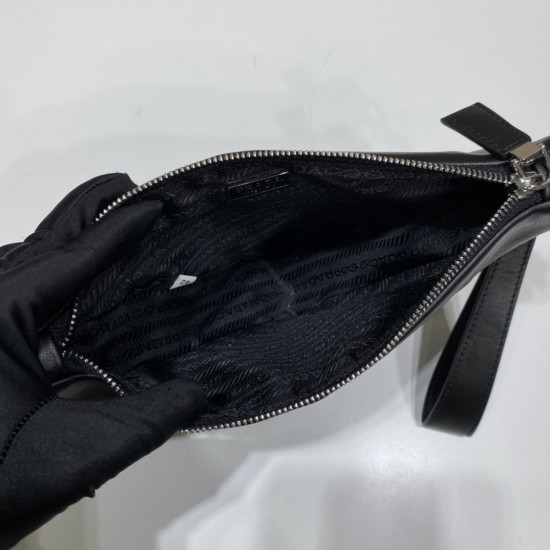 Leather Prada Triangle pouch Size: 26x14x5cm