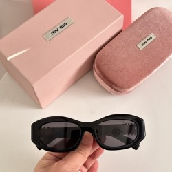 MiuMiu Sunglasses