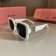 MiuMiu Sunglasses